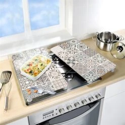 Set 2 Couvre-plaques Carreaux 5 Set 2 Couvre-plaques Carreaux -Joseph Joseph || Peugeot Soldes Magasin 628010 1 1 Set 2 couvre plaques Carreaux Wenko by Maximex